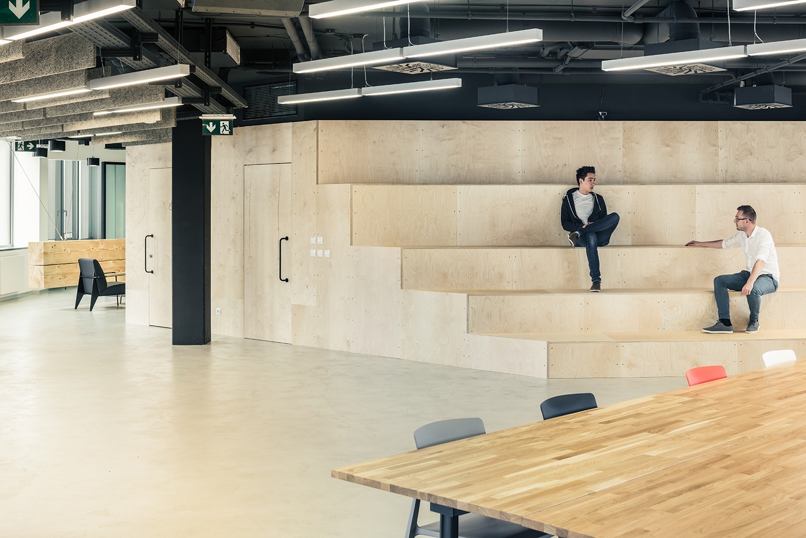 Stadium-style seating at STRV headquarters / design by Studio Perspektiv stadium